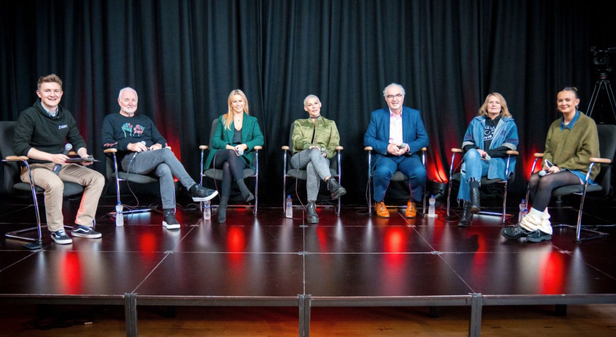 Entrepreneur panellist seated on stage